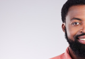Portrait, half and mockup with a black man on a gray background in studio for branding or product placement. Face, split and space with an african american male on an empty wall for advertising