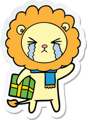 sticker of a cartoon crying lion