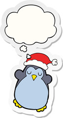 cute christmas penguin and thought bubble as a printed sticker