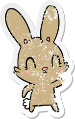 distressed sticker of a cute cartoon rabbit