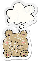 cute cartoon bear and thought bubble as a distressed worn sticker