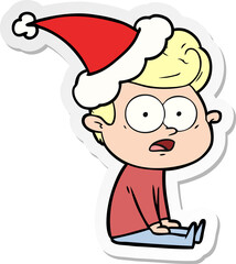 sticker cartoon of a staring man wearing santa hat