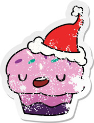 christmas distressed sticker cartoon of kawaii cupcake