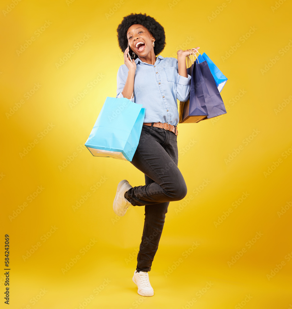 Wall mural Shopping bag, excited phone call and portrait black woman with sales product, discount fashion deal or mall store present. Talking, designer gift and happy customer chat isolated on yellow background