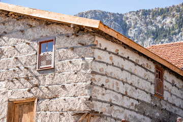Ormana's wooden and stone houses showcase the village's traditional architectural style, reflecting the turkish history and culture.
