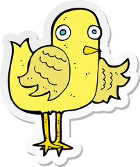 sticker of a cartoon bird waving wing