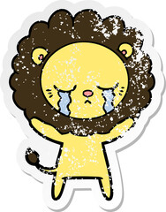 distressed sticker of a crying cartoon lion