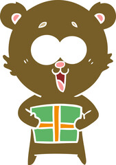 laughing teddy  bear with christmas present