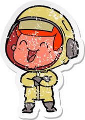 distressed sticker of a happy cartoon astronaut