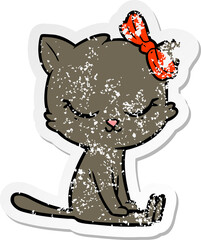 distressed sticker of a cute cartoon cat with bow