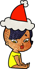 textured cartoon of a surprised girl wearing santa hat