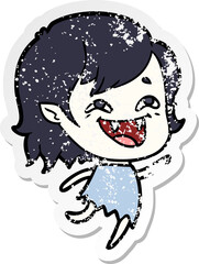 distressed sticker of a cartoon laughing vampire girl