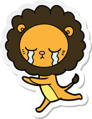 sticker of a crying cartoon lion