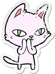 distressed sticker of a cartoon cat staring