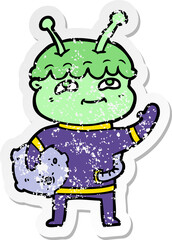 distressed sticker of a friendly cartoon spaceman waving