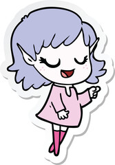 sticker of a happy cartoon elf girl pointing