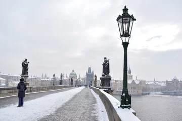 Papier Peint photo Pont Charles Romantic Snowy Prague gothic Castle with the Charles Bridge, Czech Republic