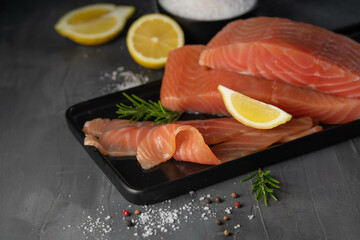 homemade smoked salmon with dill on a wooden table