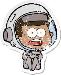 distressed sticker of a cartoon surprised astronaut