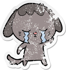 distressed sticker of a cartoon crying dog