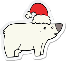 sticker of a cartoon bear wearing christmas hat