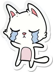 Fototapeta premium sticker of a crying cartoon cat