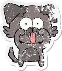 distressed sticker of a cartoon dog with tongue sticking out