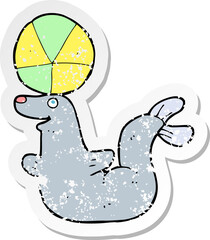 retro distressed sticker of a cartoon seal with ball