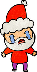 textured cartoon of a bearded man crying wearing santa hat