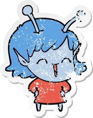 distressed sticker of a cartoon happy alien girl