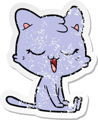 distressed sticker of a cartoon cat
