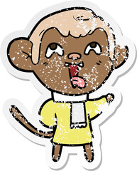 distressed sticker of a crazy cartoon monkey wearing scarf