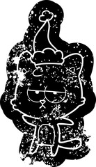 Fototapeta premium bored cartoon distressed icon of a cat wearing santa hat