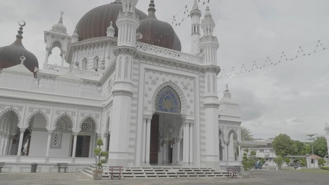 Majestic ornate mosque in Alor Setar Malaysia on cloudy day