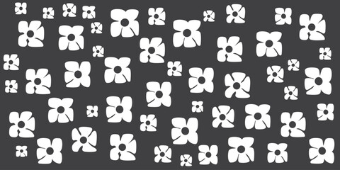 Simple Retro Style Flowers of Various Sizes Pattern - Summer or Sping Theme from the 60s, 70s - Black and White Bold Vintage Texture Design on Dark Grey Vector Background