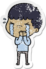 Obraz premium distressed sticker of a cartoon man crying
