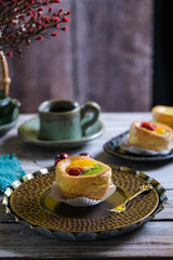 choux cream fruit, kue soes in dark background