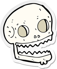 sticker of a cartoon spooky skull