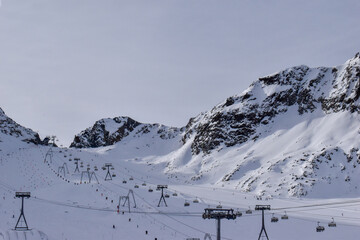 Skiing with amazing view of swiss famous mountains in beautiful winter snow.