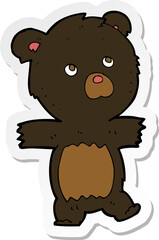 sticker of a cartoon cute black bear