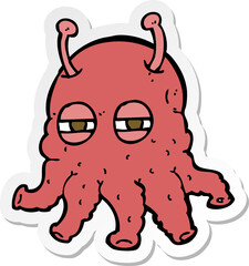 sticker of a cartoon alien face