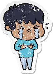 distressed sticker of a cartoon boy crying