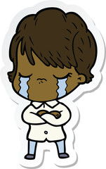 sticker of a cartoon woman crying