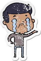 distressed sticker of a cartoon man crying