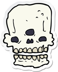 sticker of a cartoon spooky skull