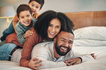 Laughing, family and portrait smile on bed in bedroom, bonding and care in home. Love, comedy and...
