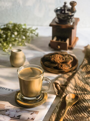 coffee milk in glass on the magazine
