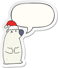 cartoon bear wearing christmas hat and speech bubble sticker