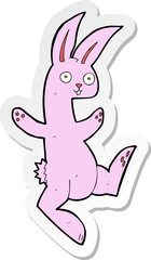 sticker of a funny cartoon pink rabbit