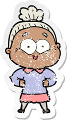 distressed sticker of a cartoon happy old woman